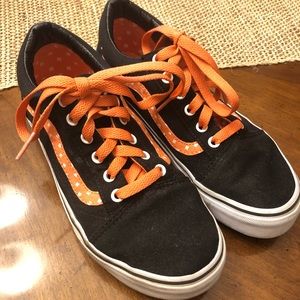 Vans orange with white polka dots.  Super cute